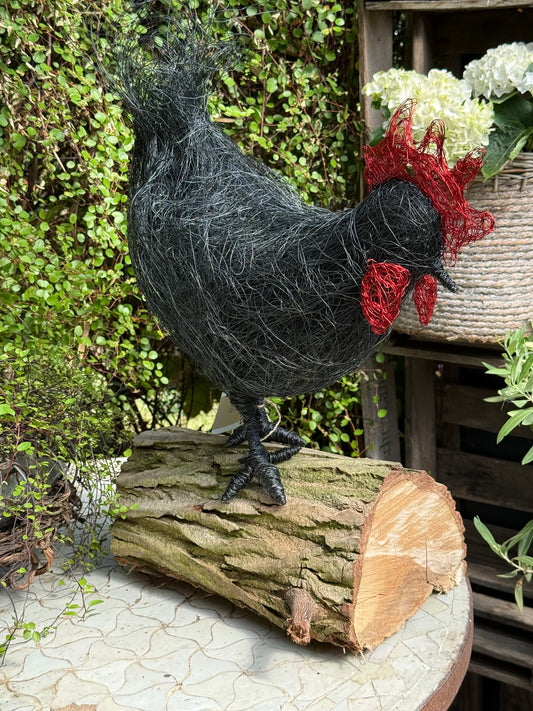 Huhn auf Baumstamm Nr. 1